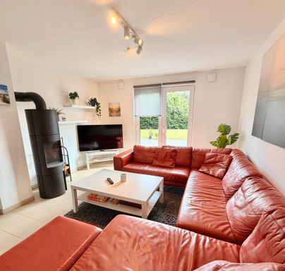 Wohnzimmer mit Kamin